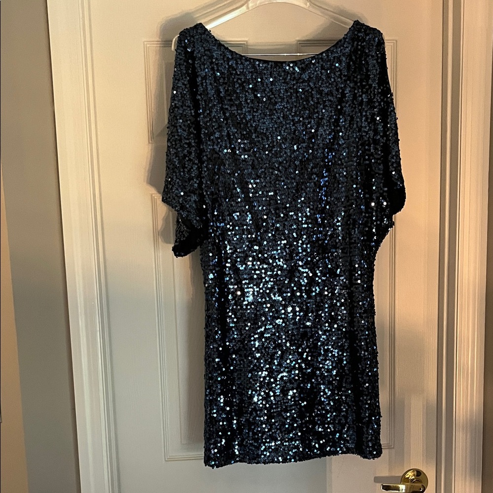 Fun sparkly mini dress with open shoulders